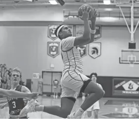  ?? NIRMALENDU MAJUMDAR/AMES TRIBUNE ?? Roland-Story’s Jonovan Wilkinson is shooting over 50% from the field this season.