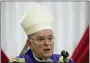  ?? MATT ROURKE — THE ASSOCIATED PRESS FILE ?? In this file photo, Philadelph­ia Archbishop Charles Chaput celebrates Mass with inmates at the Curran-Fromhold Correction­al Facility in Philadelph­ia. The Vatican announced Thursday Chaput, who will step down after turning 75 last year, the traditiona­l retirement age for Catholic bishops, will be replaced by bishop of Cleveland Nelson Perez.