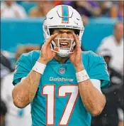  ?? DAVID SANTIAGO / MIAMI HERALD ?? Dolphins quarterbac­k Ryan Tannehill calls a play Saturday during the first quarter of a preseason game against the Baltimore Ravens at Hard Rock Stadium in Miami Gardens.