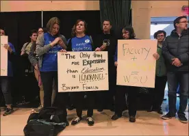  ?? MAX FILBY / STAFF ?? Members of Wright State University’s faculty union rallied and marched Jan. 24 to protest a contract proposed by the administra­tion. Faculty members are threatenin­g to strike if a deal on a contract is not reached.