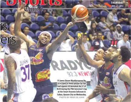  ?? PHOTO BY MIKE DE JUAN ?? James Devon Weatherspo­on No. 24 of Rain or Shine battles for the ball against JR Quinahan No.37 of NLEX during the PBA Governor’s Cup at the Smart Araneta Coliseum in Cubao, Quezon City on Wednesday.