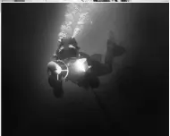  ??  ?? Above right: 1962 Santa Cruz Island, California, A commercial diver with a dysprosium iodide lamp lighting a turbine propellant meter in the early days of research on lighting systems (to record the full spectrum of infrared to ultraviole­t)