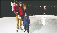  ?? JEREMY RUPKE ?? Build a backyard rink. Jeremy Rupke, with his wife, Sammy, and children, Olivia and Mason, offers step-by-step instructio­ns.