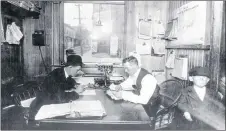  ?? SUBMITTED BY ROBERT GEORGE OF RED DEER, ALTA., AND CLYDE MACDONALD OF THE PICTOU COUNTY ROOTS SOCIETY ?? This 1931 photo shows an office inside The Evening News building on the corner of Archimedes and Forbes streets in New Glasgow. Through the window on the adjacent corner can be seen the Academy of Music (where the Bell Aliant parking lot is now...