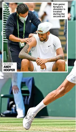  ?? ?? Pain game: Kyrgios’s shoulder is treated during the second set