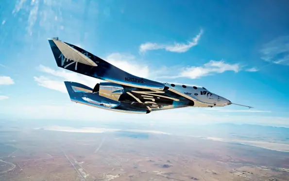  ??  ?? Virgin Galactic’s VSS Unity gliding home during a test flight.