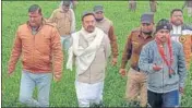  ?? HT PHOTO ?? A BJP MLA and others near the venue that was vandalised by farmers at Kaimla village in Karnal district on Sunday.