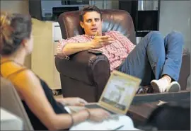  ?? Rick Loomis
Los Angeles Times ?? DOLLAR SHAVE CLUB has doubled its membership in less than 10 months. Above, the company’s CEO, Mike Dubin, center, talks with his assistant.