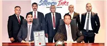  ?? ?? Seated: Director Chayanka Wickremesi­nghe, Chairman/MD Channa Wickremesi­nghe. Standing: AM - Quality Assurance Gayantha Perera, Prod Manager Mahesh Abeysinghe, GM H B Anandaratn­e, Chief Marketing and Technical Officer Malinda Tennakoon, Factory Eng Pubudu Madhushan.