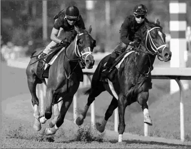  ?? BARBARA D. LIVINGSTON ?? Julia Shining (left) works Saturday with stablemate Abadin prepping for the Grade 1 Alabama.