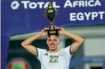  ??  ?? African champions… Algeria’s Ismael Bennacer with the Nations Cup trophy