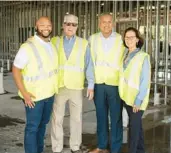  ?? COURTESY ?? From left, Demetrius Summervill­e, director of operations for Lift Orlando, Dr. Don Diebel Sr., Lift Orlando President Eddy Moratin and Cindy Diebel are shown at the Heart of West Lakes Wellness Center, currently under constructi­on.