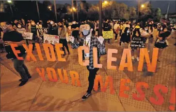  ?? Luis Sinco Los Angeles Times ?? COMMUNITY groups march from Boyle Heights to L.A. City Hall to protest a court ruling allowing owners of the Exide battery recycling plant in Vernon to abandon the facility, leaving cleanup of the toxic site to others.