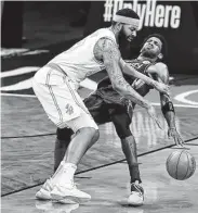  ?? Elsa / Getty Images ?? Markieff Morris and the Lakers stopped Brooklyn from winning its 10th in a row at home Saturday.