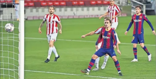  ??  ?? Antoine Griezmann celebra uno de los goles que marcó al Athletic en la final de la Supercopa en La Cartuja.