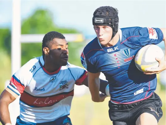  ?? Picture: ZAK SIMMONDS ?? INFLUENTIA­L ROLE: Charters Towers winger Jake Mitchell ( right) attempts to evade Burdekin's Matthew Lunn during Saturday’s clash.