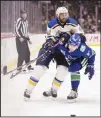  ?? (AP) ?? St Louis Blues’ Robert Bortuzzo (41) is checked by Vancouver Canucks’ Tyler Motte (64) during the first period of an NHL hockey game in Vancouver, British Columbia on Jan 27.