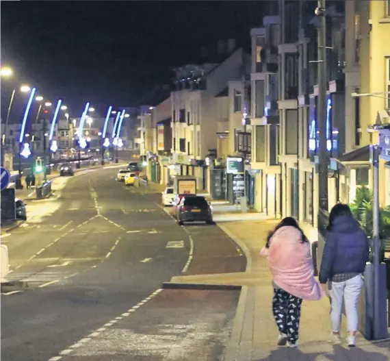  ?? MARGARET MCLAUGHLIN ?? Silent night: The scene on a neardesert­ed promenade in Portstewar­t at midnight on New Year’s Eve