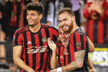  ?? CURTIS COMPTON / CCOMPTON@AJC.COM ?? United defender Miles Robinson (left) had great chemistry with the more aggressive Leandro Gonzalez Pirez (right). With Gonzalez Pirez gone, Robinson looks forward to a new chapter in the backfield.