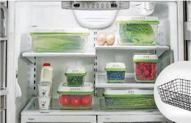  ?? [PHOTO PROVIDED BY RUBBERMAID/AP] ?? Rubbermaid’s FreshWorks food storage system, which have vented lids and crisper trays that keep foods like fruits and vegetables fresher longer. Storing perishable­s in the fridge and off counters is a key way to keep pests at bay in the urban kitchen...