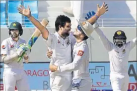  ?? AFP ?? Sri Lanka offspinner Dilruwan Perera celebrates the wicket of Pakistan’s Muhammad Amir on the final day of the second Test in Dubai. This was Pakistan’s first series loss at their adopted home.