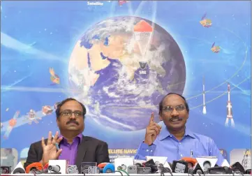  ??  ?? Sivan (right) gestures while addressing a press conference at the ISRO headquarte­rs Antariksh Bhavan in Bangalore held to announce Chandrayaa­n 2, ISRO’s planned man to the moon mission. — AFP photo