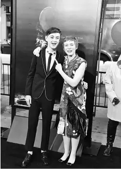  ?? — AFP photo ?? Actors Jaeden Lieberher (left) and Sophia Lillis arrive for the world premiere of ‘It’ on Tuesday at the TCL Chinese Theatre in Hollywood, California.