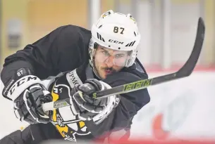  ?? PETER DIANA/PITTSBURGH POST-GAZETTE VIA AP ?? The Penguins team captain Sidney Crosby dished out three assists in Pittsburgh’s lopsided 6-0 win to give the Penguins a 3-2 lead against the Predators.