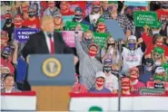  ?? AP PHOTO/CHARLIE NEIBERGALL ?? President Donald Trump speaks at a campaign rally Wednesday at Des Moines Internatio­nal Airport in Des Moines, Iowa.