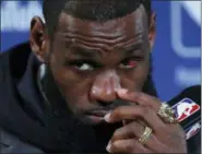  ?? BEN MARGOT — THE ASSOCIATED PRESS ?? Cleveland Cavaliers forward LeBron James speaks at a news conference after Game 2 of the NBA Finals between the Golden State Warriors and the Cavaliers in Oakland Sunday. The Warriors won 122-103. Tensions have been high at times in the first two games...