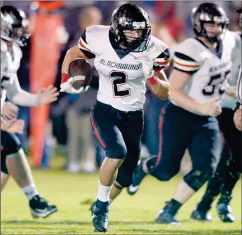  ?? NWA Democrat-Gazette File Photo/ANDY SHUPE ?? Pea Ridge running back Samuel Beard, shown carrying the ball against Prairie Grove in 2018, returns for the Blackhawks this season.