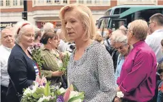  ?? Pictures: AP/PA. ?? The body of three-year-old Alan Kurdi is lifted from a beach in Turkey in September last year, and actress Juliet Stevenson at yesterday’s memorial event.