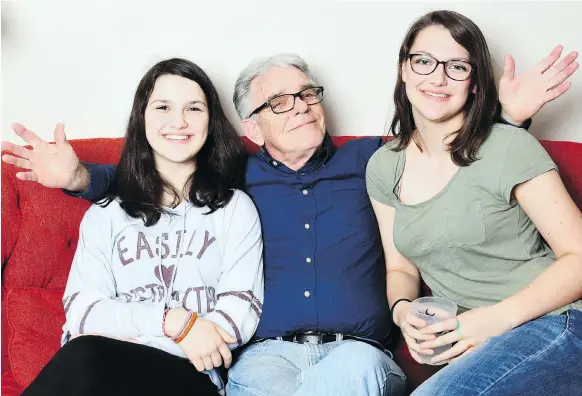  ??  ?? Frank Smith lives with his son and daughter-in-law in a multi-generation­al home in Virginia. Among the benefits is a closer relationsh­ip with his granddaugh­ters, Lauren, left, and Audrey.