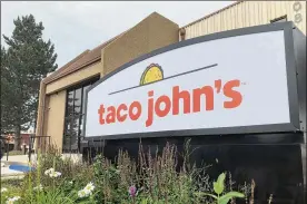  ?? MEAD GRUVER / AP ?? Taco John’s recently sent Freedom’s Edge Brewing Co. in Cheyenne a cease-and-desist letter for using “Taco Tuesday” to advertise the taco truck parked outside on Tuesdays. Taco John’s has owned the trademark to “Taco Tuesday” since 1989.