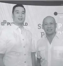 ??  ?? PUREGOLD President Vincent Co and Globe President and CEO Ernest Cu jointly launch SALLY