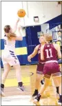  ?? Westside Eagle Observer/MIKE ECKELS ?? Schopper (left) intercepts a Lady Leopard pass near center court giving the Lady Bulldogs possession of the ball.