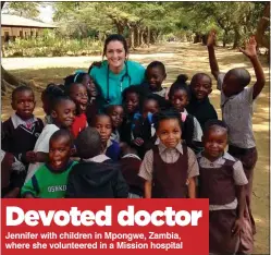  ??  ?? Devoted doctor Jennifer with children in Mpongwe, Zambia, where she volunteere­d in a Mission hospital