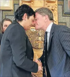  ?? Photo: FAIRFAX NZ ?? Mutual respect: Te Atiawa Manawhenua ki Te Tau Ihu Trust chairwoman Glenice Paine greets Treaty Negotiatio­ns Minister Chris Finlayson with a hongi before signing the settlement.