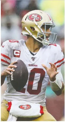  ?? ROB CARR/GETTY IMAGES ?? Jimmy Garoppolo has thrown six intercepti­ons against seven touchdowns, but the only number that counts to his teammates in San Francisco is the 49ers are 6-0 heading into this week’s game against Carolina after going 4-12 last season..