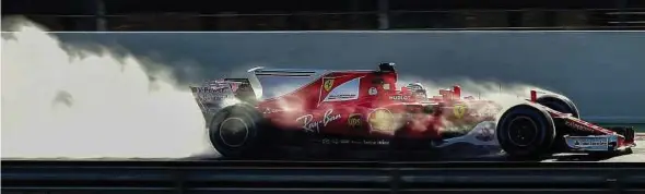  ?? AFP PIC ?? Ferrari’s Kimi Raikkonen drives in the wet on the fourth day of the first week of tests at the Circuit de Catalunya on Thursday.