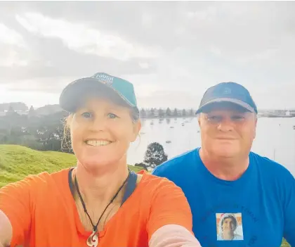  ?? Photo / Supplied ?? Ethan Broomhead could carve a “mean rooster tail” when waterskiin­g.
Tanya and David Broomhead wear their son’s favourite colours, orange and blue, as they embark on a mission to help raise money for Lifeline.