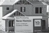  ?? Mark J. Terrill / Associated Press ?? Homebuilde­rs are poised to benefit this homebuying season amid strong demand, low mortgage rates and an all-time low inventory of homes for sale.