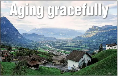  ?? The New York Times/MARINA PASCUCCI ?? Triesenber­g, the town at the highest elevation in Liechtenst­ein, offers beautiful views. In honor of the tiny country’s 300th anniversar­y, there’s now a trail linking all 11 of its towns.