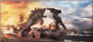  ?? Courtesy of Warner Bros. Pictures / TNS ?? Godzilla battles Kong in Warner Bros. Pictures’ and Legendary Pictures’ action adventure “Godzilla vs. Kong.”