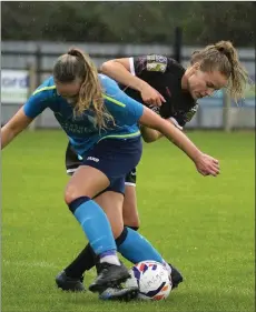  ??  ?? Lynn Craven battling for the ball with Fiona Donnelly.