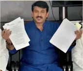  ?? — PTI ?? Delhi BJP president Manoj Tiwari demands immediate dismissal of AAP MLAs who have been charged with holding “office of profit” at a press conference in New Delhi on Saturday.