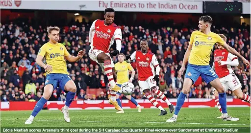  ?? RYAN PIERSE/GETTY IMAGES ?? Eddie Nketiah scores Arsenal’s third goal during the 5-1 Carabao Cup Quarter Final victory over Sunderland at Emirates Stadium