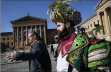  ?? ALEX BRANDON — THE ASSOCIATED PRESS ?? Eagles center Jason Kelce, right, arrives in front of the Philadelph­ia Museum of Art after the Super Bowl victory parade Thursday in Philadelph­ia.