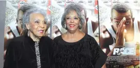  ?? | KEVIN TANAKA/FOR THE SUN-TIMES ?? Gloria Owens Hemphill (left) and her sister Marlene Owens Rankin attend the premiere of ‘‘Race,’’ a film about their father, Jesse Owens.