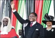  ?? (AP/Thoko Chikondi) ?? Malawi President Lazarus Chakwera greets supporters in the capital, Lilongwe, after being sworn in Sunday.